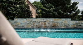 Geometric Pool with Raised Sheer Descent Wall